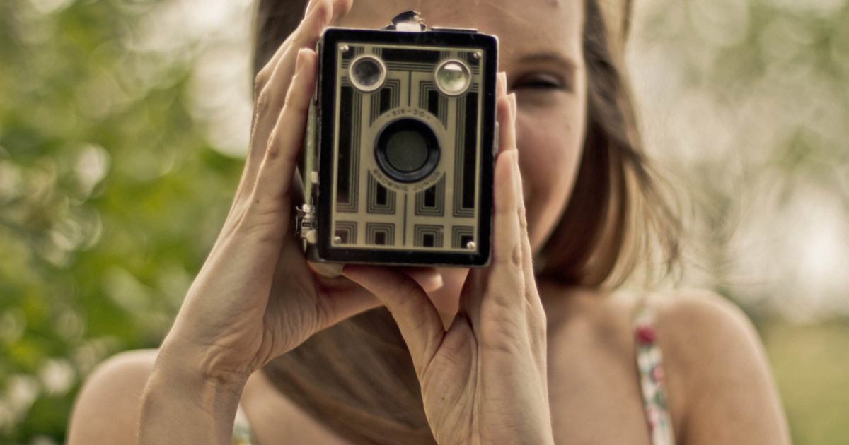 Photographer, photography, camera, lens, female, girl, woman, professional photographer, professional, pictures, brown camera, brown photography